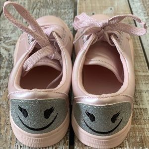 Girls light pink smiley face sneakers, never worn.